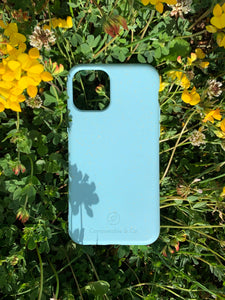 Compostable & Co. iPhone 11 blue biodegradable phone case with natural background