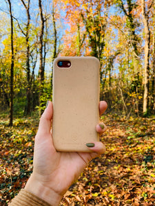 Compostable & Co. iPhone 7 / 8 / SE 2020 yellow biodegradable phone case in hand