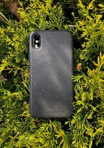 Compostable & Co. iPhone x / xs black biodegradable phone case with natural background