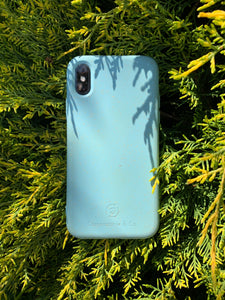 Compostable & Co. iPhone x / xs blue biodegradable phone case with natural background