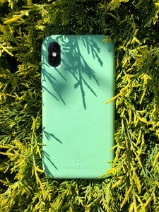Compostable & Co. iPhone x / xs green biodegradable phone case with natural background